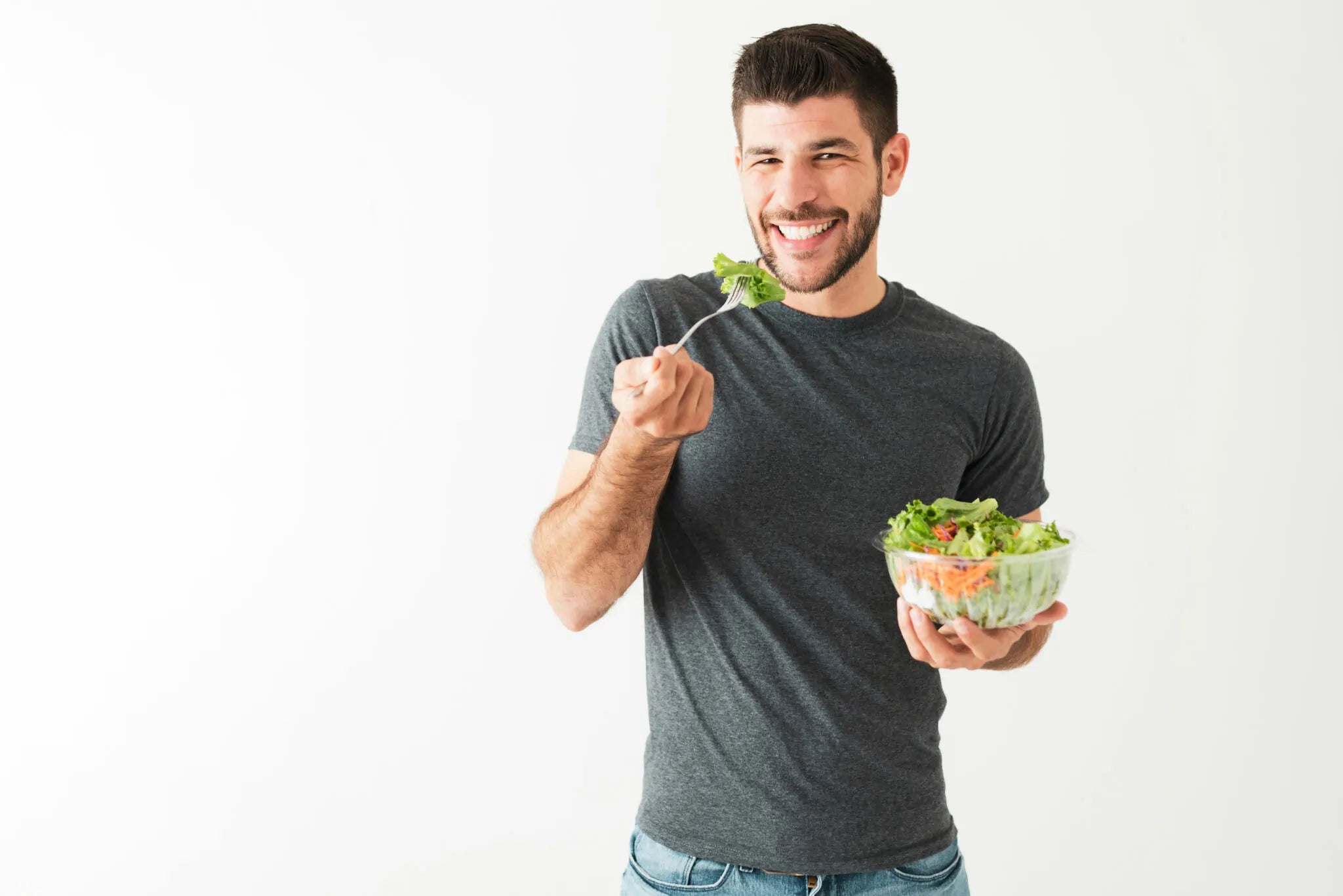 man eating salad